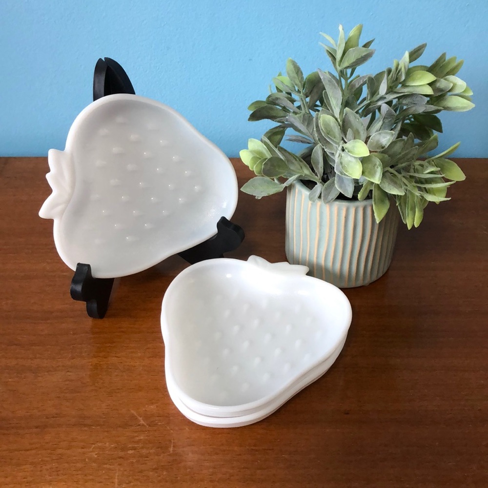Vintage milk glass strawberry shaped dishes.